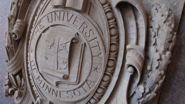 Detail of Board of Regents seal carved in stone.